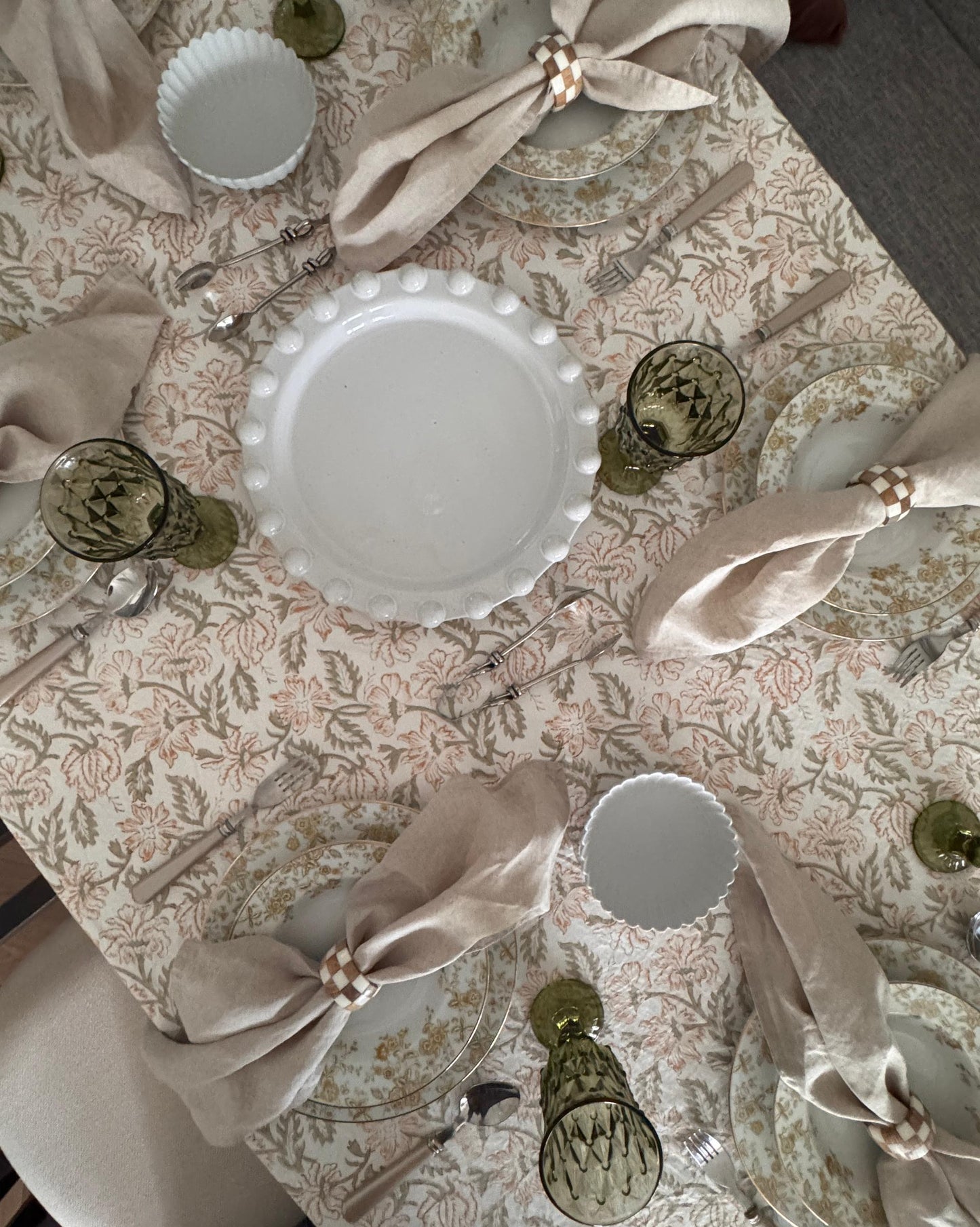 Pale grey round stoneware platter styled as an elegant centerpiece fruit bowl for everyday dining counter decor