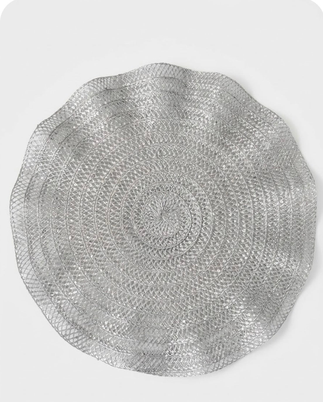  A round woven Ruffles Placemats in silver for daily use or festive hosting
