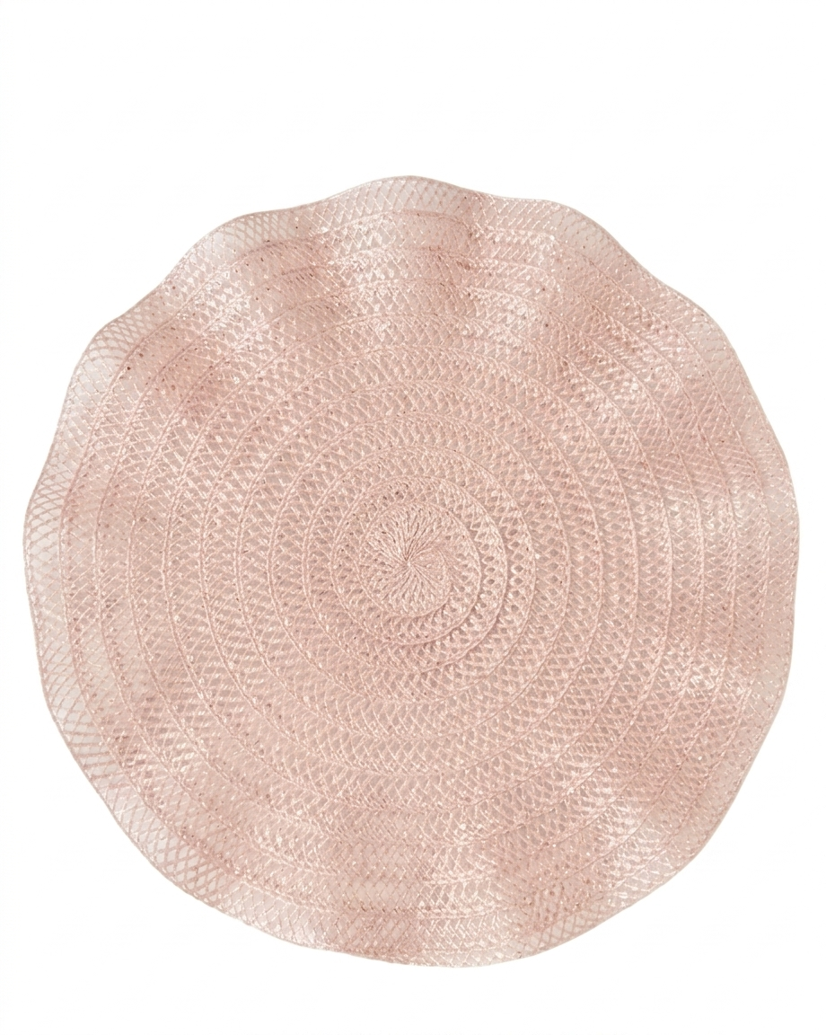  A round woven Ruffles Placemats in pink for daily use or festive hosting