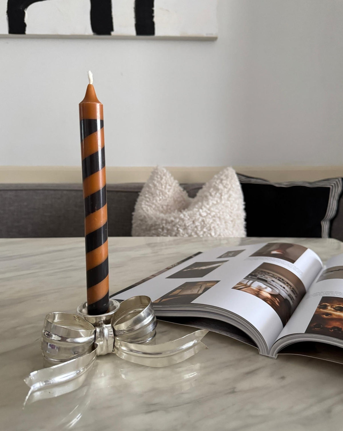 silver plated coquette bow candle holder decor in modern contemporary home